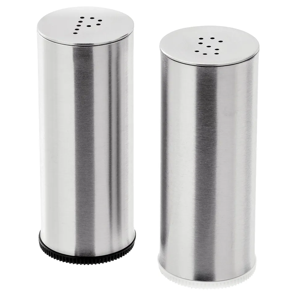 Set of two silver metallic, cylindrical shaped salt and pepper shakers, one with a black base. Made of stainless steel and plastic.